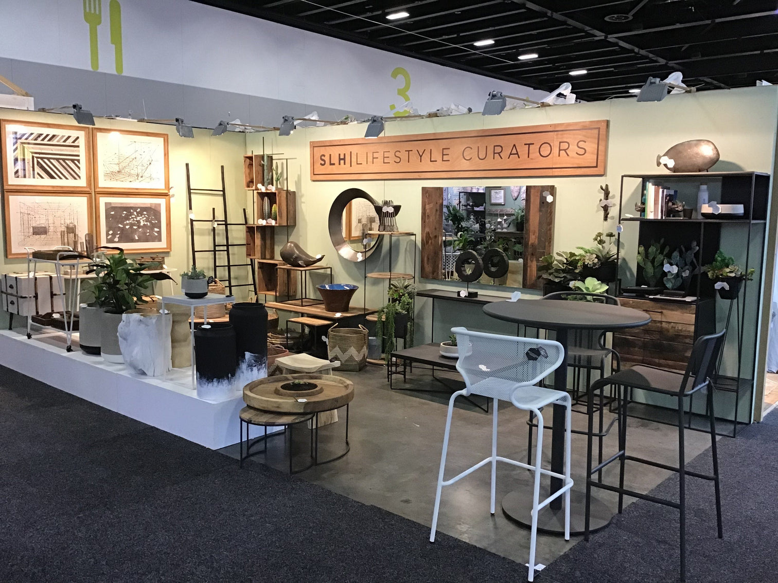Interior design display with furniture and decor.